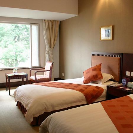 Suzhou Taoyuan International Holiday Hotel Номер фото