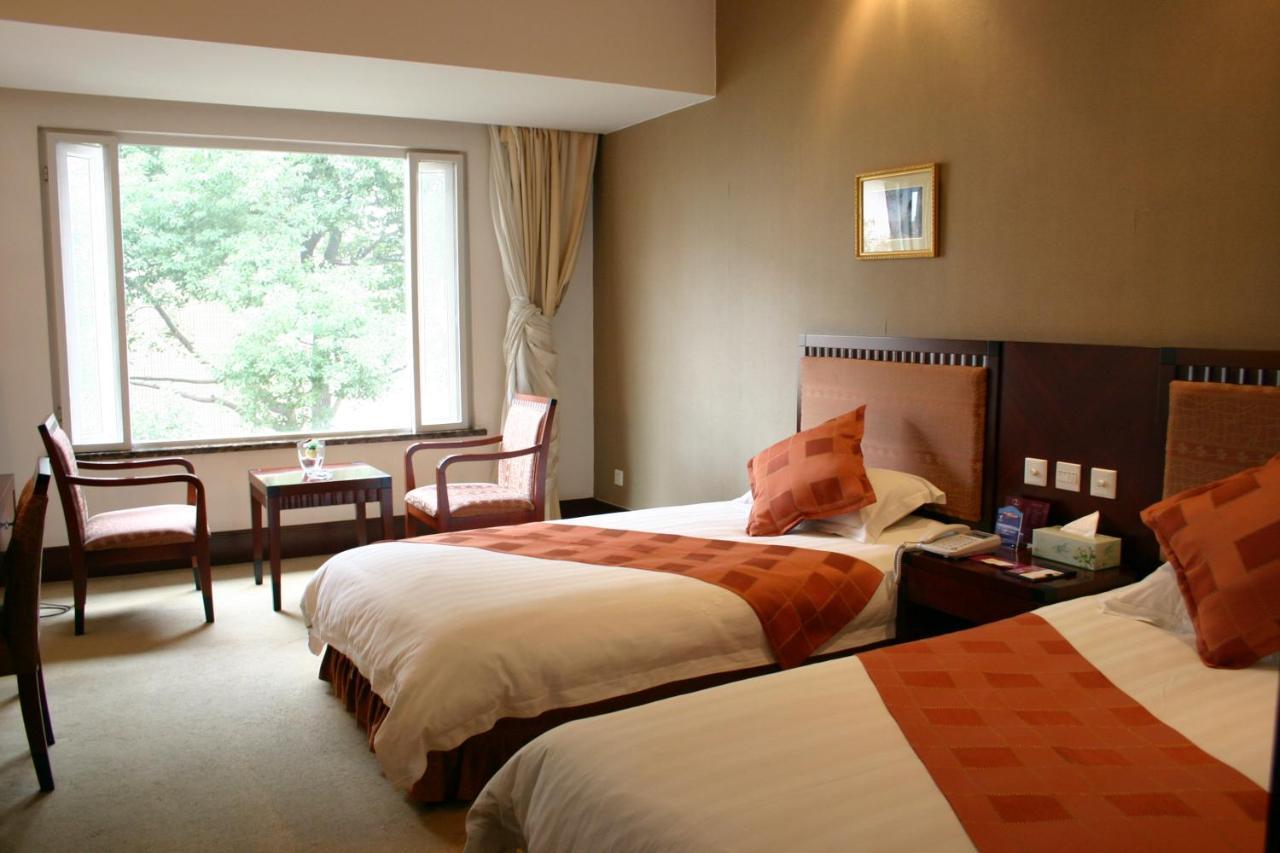 Suzhou Taoyuan International Holiday Hotel Номер фото
